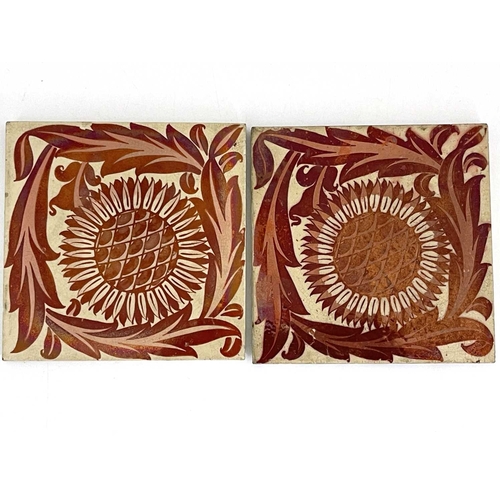 736 - William De Morgan, a pair of red lustre Sunflower tiles, circa 1878, painted on Craven Dunnil and Co... 