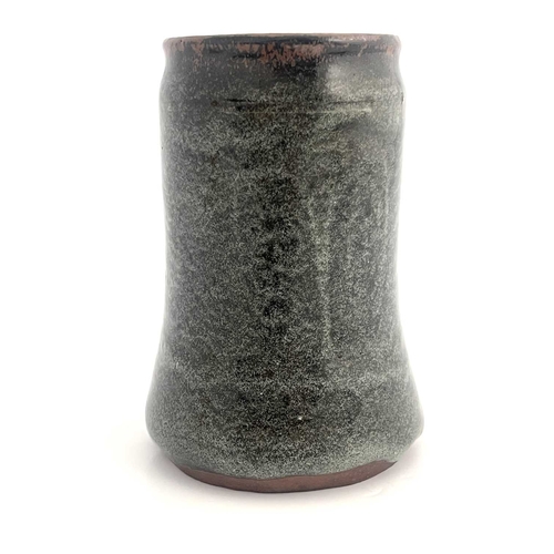 746 - Gugong Bong, an Abuja studio pottery mug, circa 1967-71, tankard form, tenmoku glazed with spiral de... 