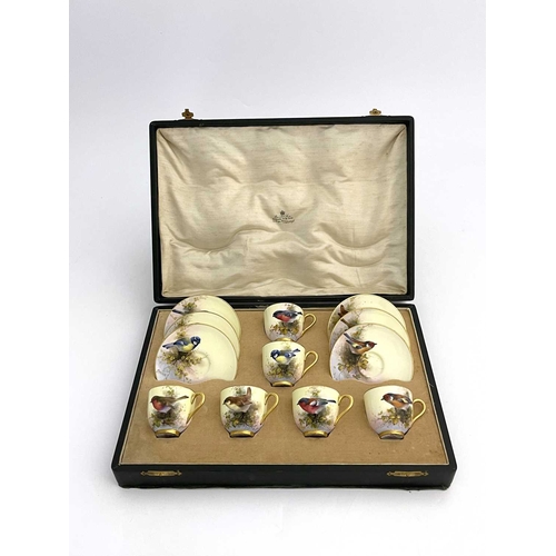 765 - E Barker for Royal Worcester, a bird painted coffee set, decorated with English garden birds, includ... 