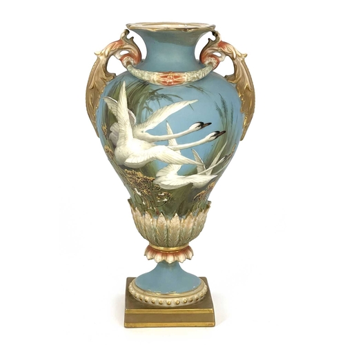 770 - Charles Baldwyn for Royal Worcester, a twin handled vase,1899, double gourd pedestal urn form, acant... 