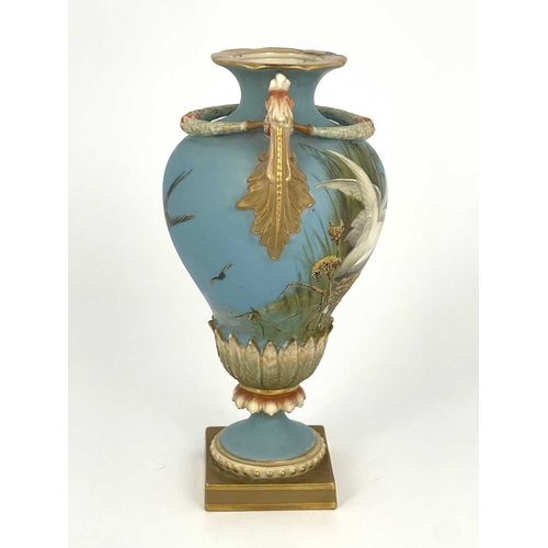 770 - Charles Baldwyn for Royal Worcester, a twin handled vase,1899, double gourd pedestal urn form, acant... 