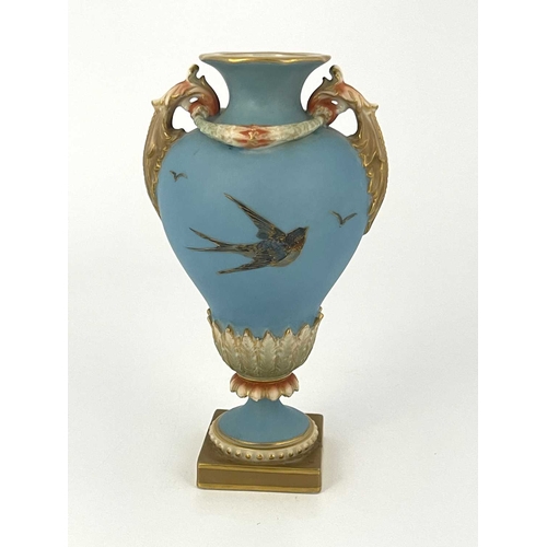 770 - Charles Baldwyn for Royal Worcester, a twin handled vase,1899, double gourd pedestal urn form, acant... 