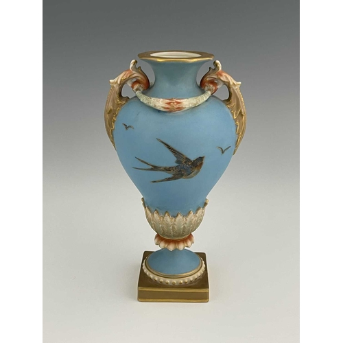 779 - Charles Baldwyn for Royal Worcester, a twin handled vase,1899, double gourd pedestal urn form, acant... 