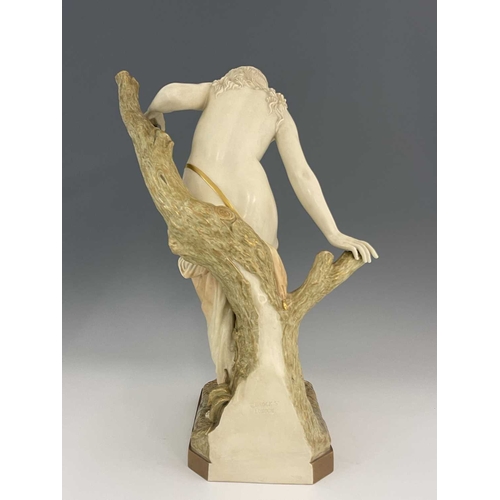 780 - A Royal Worcester figure 'The Bather', circa 1903 modelled as a semi robed maiden afore a tree stump... 