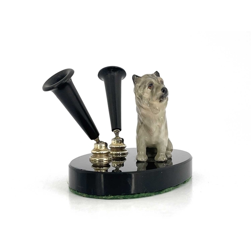 786 - A Royal Doulton dog pen holder, the black base with a terrier dog Note: this actual pen stand is ill... 