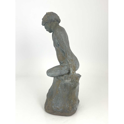 788 - Leslie Harradine for Royal Doulton, a stoneware garden sculpture, modelled as a nude child on a rock... 