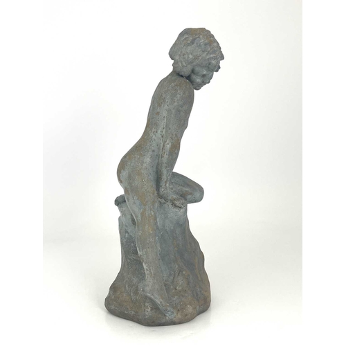 788 - Leslie Harradine for Royal Doulton, a stoneware garden sculpture, modelled as a nude child on a rock... 