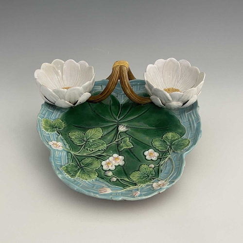 791 - A Minton majolica strawberry dish, 1873, relief moulded trefoil form, basket weave and strawberry le... 