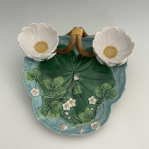 791 - A Minton majolica strawberry dish, 1873, relief moulded trefoil form, basket weave and strawberry le... 