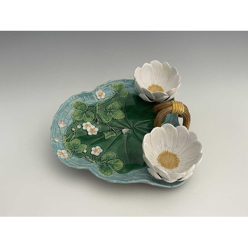 791 - A Minton majolica strawberry dish, 1873, relief moulded trefoil form, basket weave and strawberry le... 