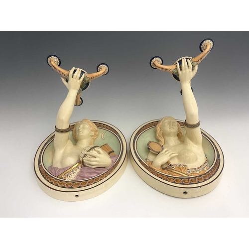 793 - A pair of Minton relief moulded wall sconces, circa 1860s, modelled a allegorical figures of Truth a... 