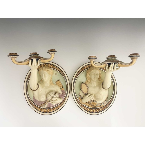 793 - A pair of Minton relief moulded wall sconces, circa 1860s, modelled a allegorical figures of Truth a... 