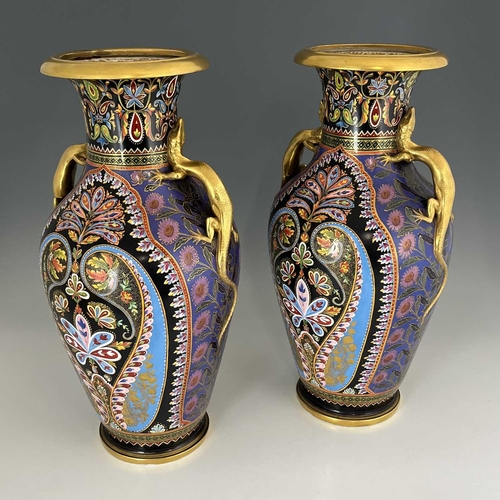 793A - A large pair of Copeland Spode vases or lamp bases, shouldered form, relief moulded with lizard hand... 