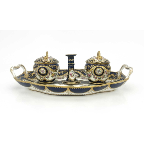 794 - A Coalport inkstand, circa 1830, oval ogee twin handled form, the two fixed lidded inkwells with bra... 