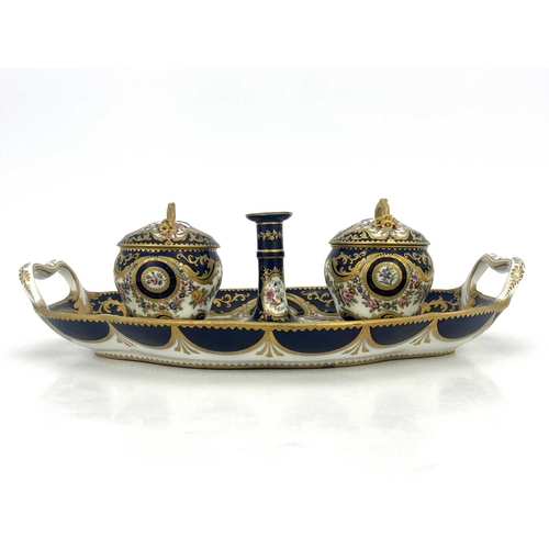 794 - A Coalport inkstand, circa 1830, oval ogee twin handled form, the two fixed lidded inkwells with bra... 