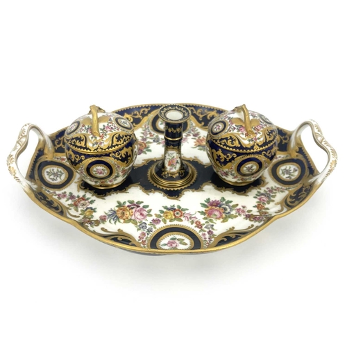 794 - A Coalport inkstand, circa 1830, oval ogee twin handled form, the two fixed lidded inkwells with bra... 