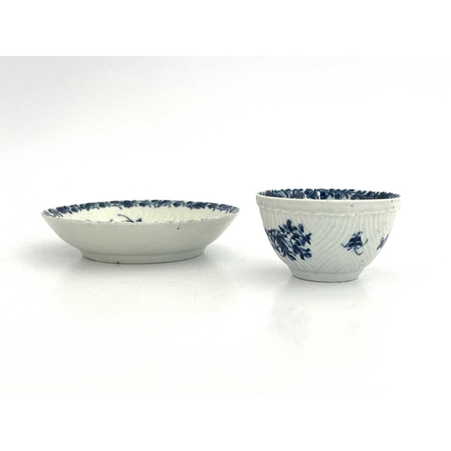 802 - A Worcester blue and white tea bowl and saucer, workmans marks, circa 1757, in the Feather Mould Flo... 