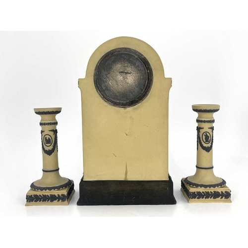 804 - A Wedgwood tri colour Jasperware clock garniture set, yellow ground, domed bracket form with black r... 