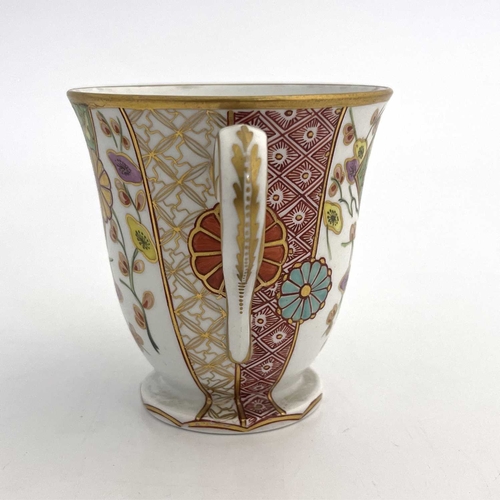 809 - A Spode 287 pattern twin handled cup, circa 1810, footed form, painted with Japanese Kakiemon style ... 