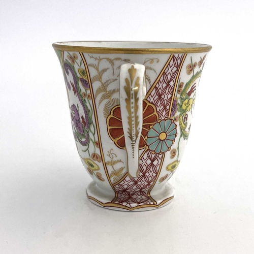 809 - A Spode 287 pattern twin handled cup, circa 1810, footed form, painted with Japanese Kakiemon style ... 