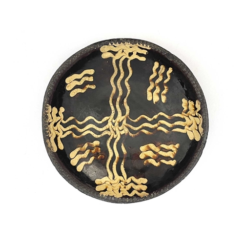 855 - An English slipware dish, circa 1780, circular form with pie-crust rim, 33cm diameter