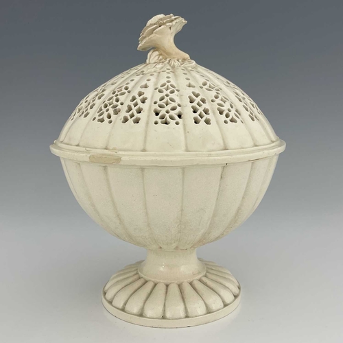 860 - A Creamware comport, with reticulated cover and flower finial, Leeds, circa 1780, 22.5cm high