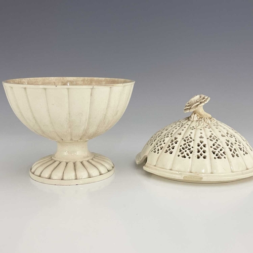 860 - A Creamware comport, with reticulated cover and flower finial, Leeds, circa 1780, 22.5cm high