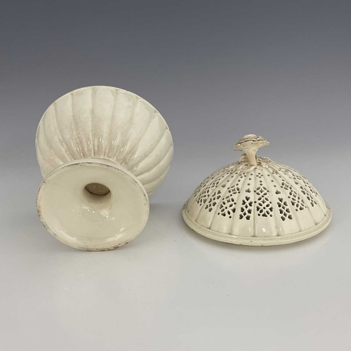 860 - A Creamware comport, with reticulated cover and flower finial, Leeds, circa 1780, 22.5cm high