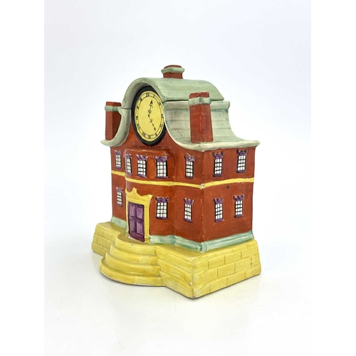 863 - A Staffordshire pottery pastille burner, in the form of a mansion with clock dial, circa 1820, 17cm ... 