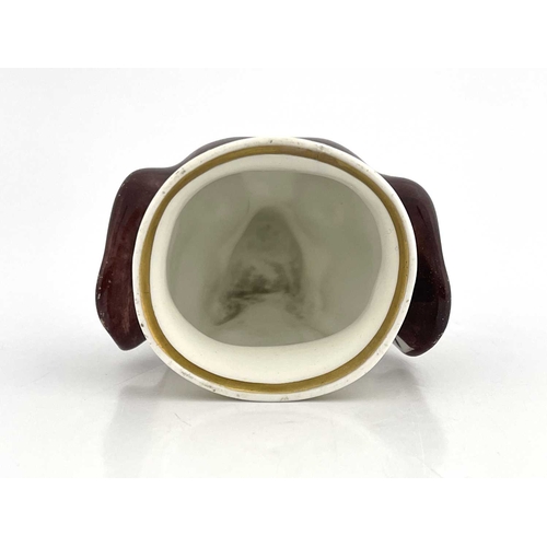 864 - A Copeland-Garret hound stirrup cup, circa 1840, 11.5cm high