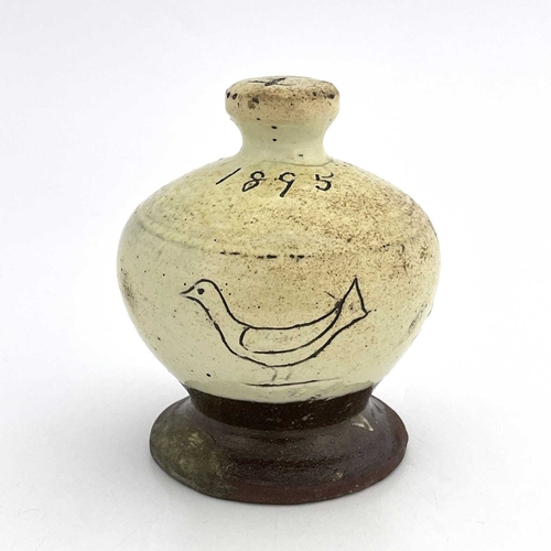 865 - A slip-decorated money box, dated 1895 with initials 