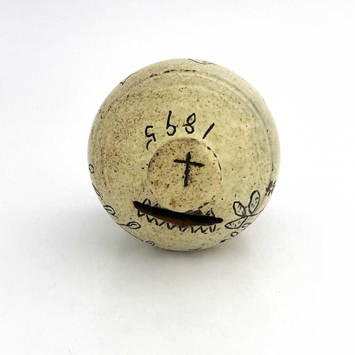 865 - A slip-decorated money box, dated 1895 with initials 