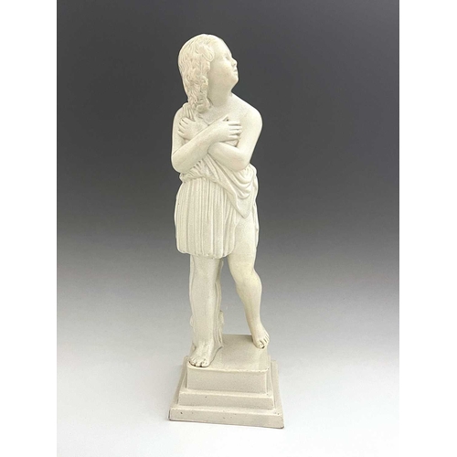 866 - A large white pearl ware classical figure of a child. 56 cm tall.