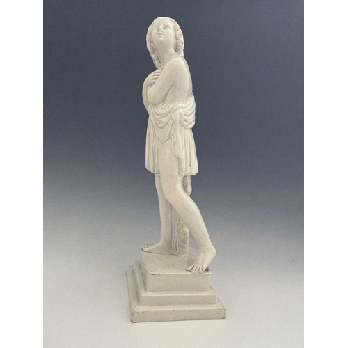 866 - A large white pearl ware classical figure of a child. 56 cm tall.