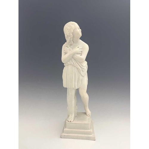 866 - A large white pearl ware classical figure of a child. 56 cm tall.