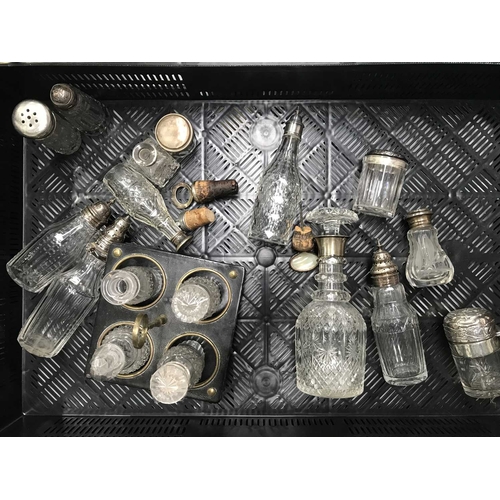 16 - A collection of silver mounted glassware including scent bottles, condiment sets etc