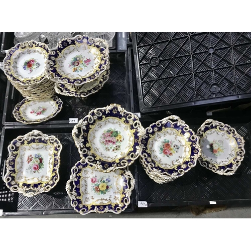 59 - An English porcelain part dessert service, in the Ridgeway style, painted with sprays of summer flow... 
