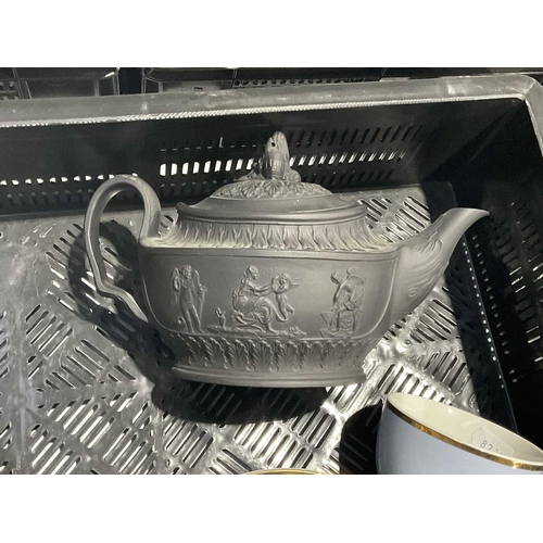 68 - A black basalt teapot, boat form, the lid with classical figural finial, the body moulded with class... 