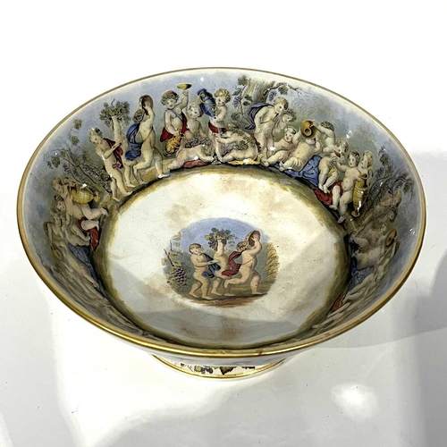 70 - Two Prattware punch bowls, circular form, printed with Bacchanalian scenes, 34cm diameter (2)