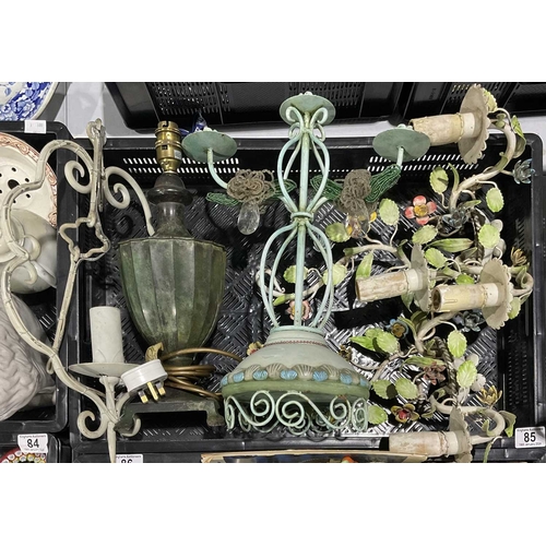 85 - A pair of Italian painted metal wall light brackets, decorated with flowers and leaves, a metal hang... 