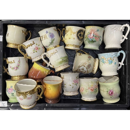 99 - A collection of Belleek Ceramics Art Company shaving mugs, mostly floral decorated, some monogrammed... 