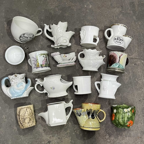 110 - A collection of Continental and British shaving mugs, including Byzanta Ware Watteau, Gesetzlich Ges... 