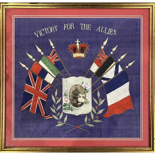 122 - A WWI 'Victory For The Allies' silkwork embroidery, black and white portrait image within floral cus... 