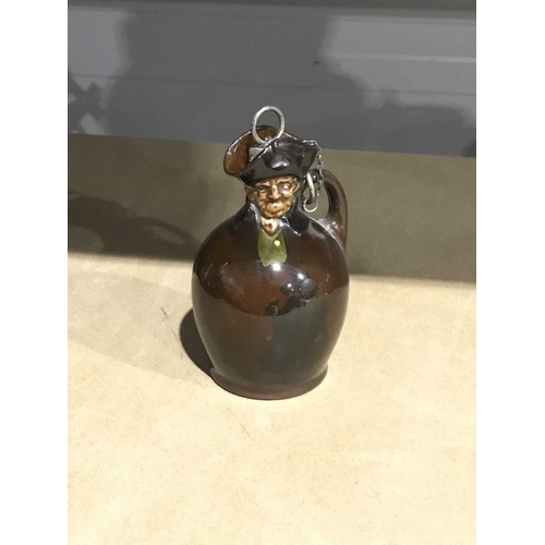 160 - A Royal Doulton Kingsware Nightwatchmen flask and stopper, baluster form, Rd No.436947, 9.5cm high
