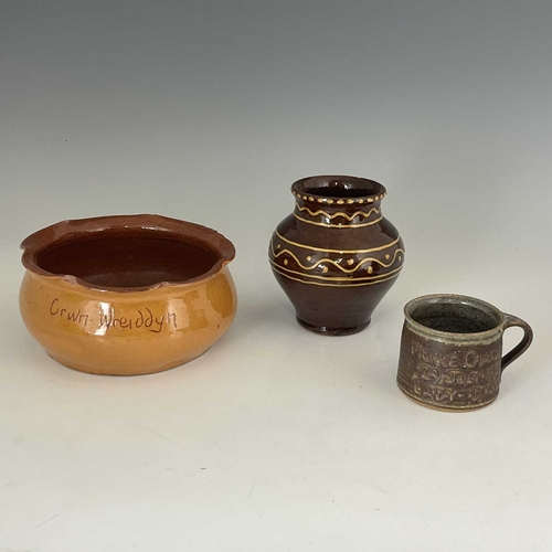 172 - A collection of Ewenny pottery, including a slipware bowl, 22cm diameter, 10cm high, a commemorative... 