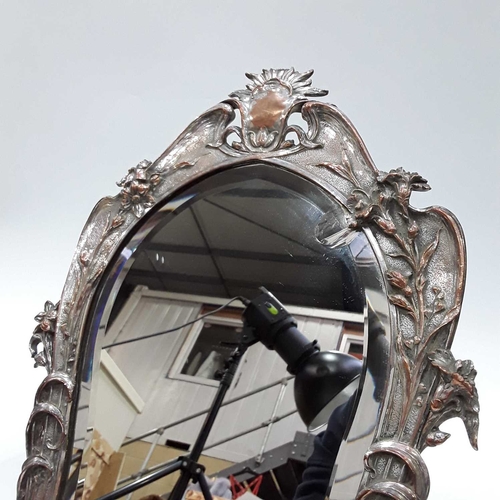 184 - An Arts and Crafts silver plated easel mirror, Walker and Hall, circa 1904, the bevelled and arched ... 