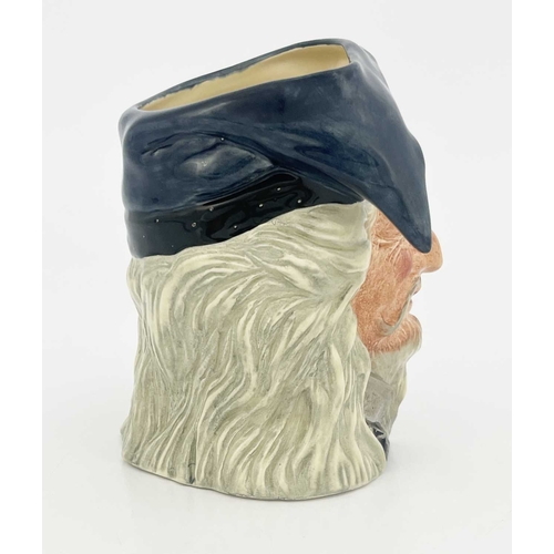 191 - Stanley James Taylor for Royal Doulton, a character jug, The Wizard D 6862, highlighted in silver, 1... 