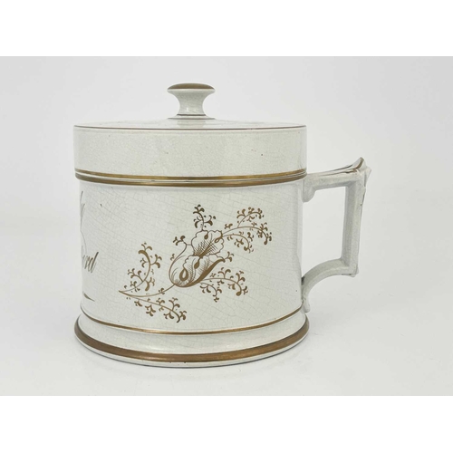 216 - A Staffordshire pottery presentation shaving mug/tankard and cover, circa 1850, with gilded knopped ... 