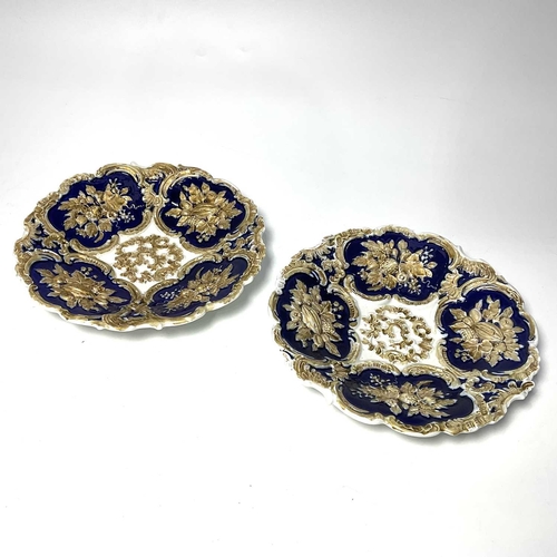 264 - Two early 20th century Leuteritz style relief moulded Meissen plates, dished circular form, decorate... 