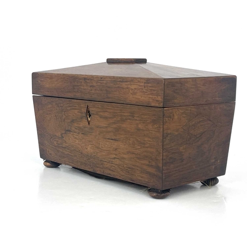 343 - A Regency rosewood tea caddy, circa 1820, of sarcophagus form, fitted interiors with twin lidded com... 